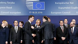 EU leaders begin negotiations on controversial refugee deal