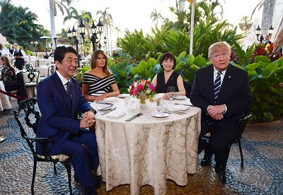 President Donald Trump and first lady Melania Trump dine with Japanese Prime Minister Shinzo Abe and wife Akie Abe at the Mar-a-Lago resort in Palm Beach, Fla., on April 17.