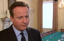David Cameron "choqué et inquiet" propose son aide à la Belgique