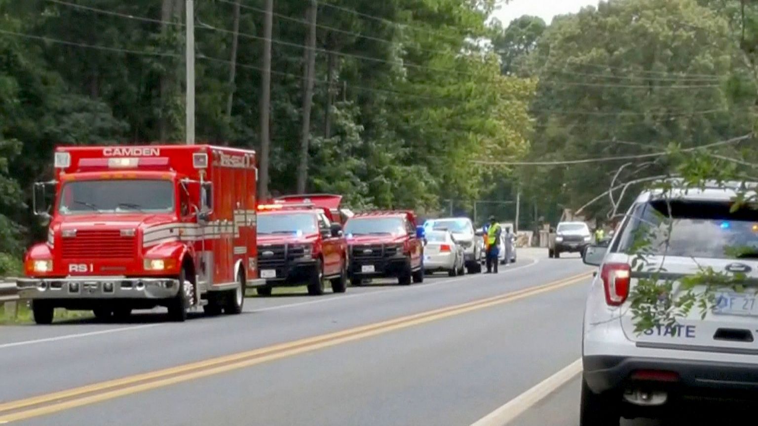 The scene off Highway 24 in Ouachita County, Arkansas where a wrecked car w