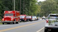 The scene off Highway 24 in Ouachita County, Arkansas where a wrecked car w