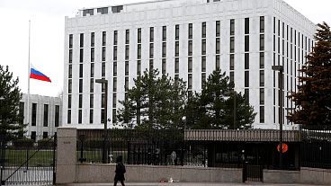 Image: A pedestrian walks past the Russian Embassy in Washington Image: A pedestrian walks past the Russian Embassy in Washington