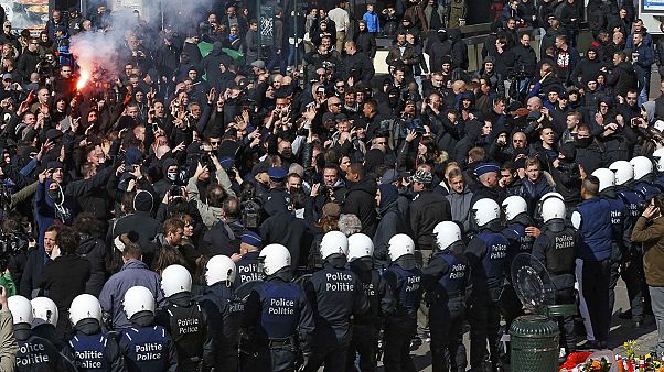 Brussels riot police use water cannon to break up protest Brussels riot police use water cannon to break up protest