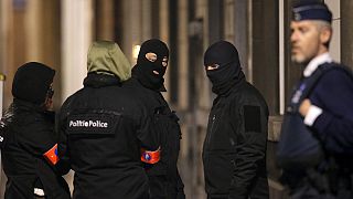 Brussels bombings: Belgian police question nine after raids