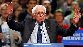 US primaries: Sanders challenges Clinton to debate on home turf