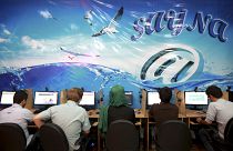 Iranians surf the Internet at a cafe in Tehran, Iran