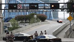 Image: Florida Highway patrolmen block the entrance to the Main Street Brid