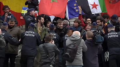 Belgian police remove left-wing protesters