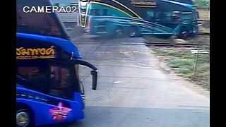 Deadly collision between train and double-decker bus in Thailand