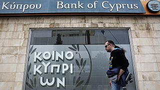 Cyprus starts working week out of bailout