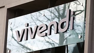 Italy's Mediaset sells pay-TV unit to Vivendi and agrees share swap