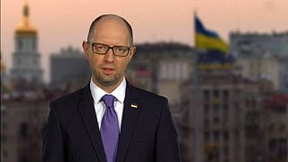 Ukraine's prime minister resigns in televised address