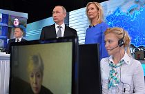Putin defends Russia's Syrian intervention and withdrawal in TV phone-in