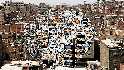 Graffiti art gives a fresh face to Cairo's impoverished neighbourhood