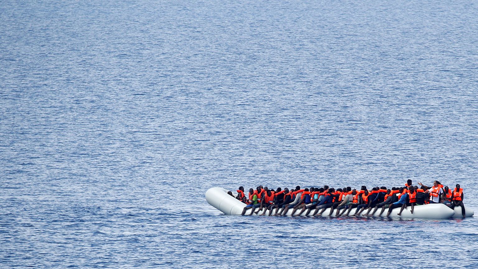 Migrants wait to be rescued in the Mediterranean Sea off the coast of Libya