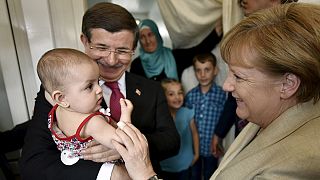 Merkel backs Turkey's idea of 'safe zones' for refugees in Syria