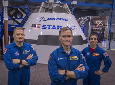 Astronauts Eric Boe, left,  Chris Ferguson and Nicole Mann will be the inaugural crew of the Boeing CST-100 Starliner on its test flight to the International Space Station.
