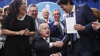 Image: Gov. Jerry Brown signs environmental measure SB100