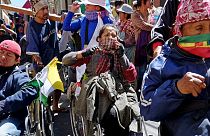 Bolivian police use tear gas on disabled protesters demanding a rise in state benefits