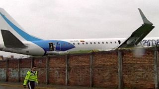 Plane skids off runway in Ecuador