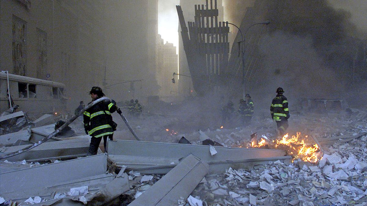 Image: File picture shows firemen working around the World Trade Center aft