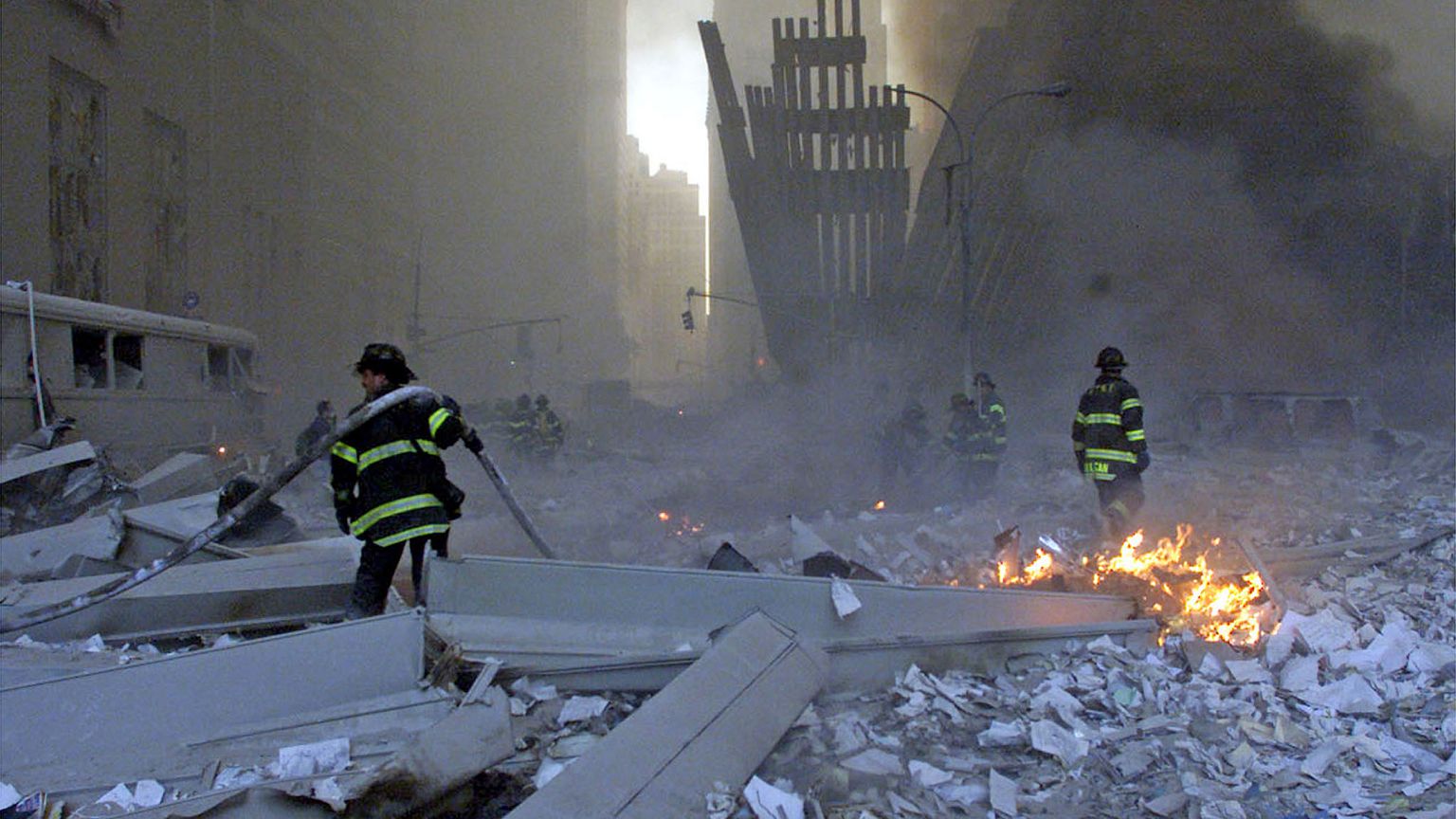 Image: File picture shows firemen working around the World Trade Center aft