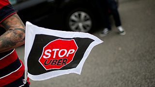 Latin American cabbies step up protests over Uber