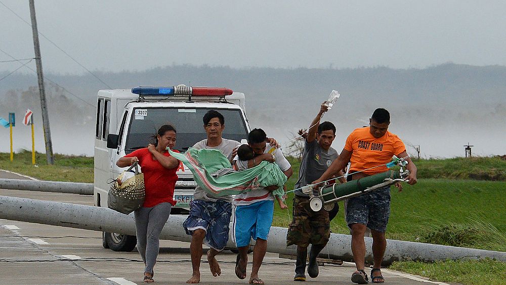 Powerful typhoon kills at least 12 in Philippines