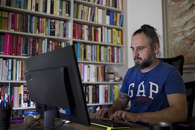 Tunca Öğreten, a Turkish journalist who spent a year in jail without trial, at home in Istanbul.