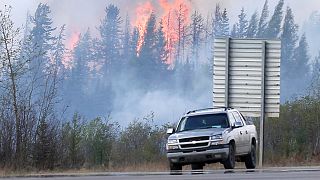 Change in weather helps fight Canada wildfire