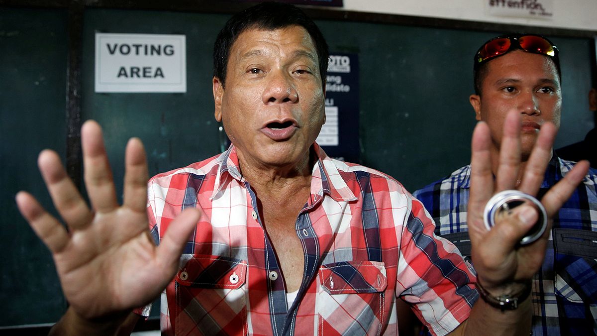 Outspoken mayor Duterte leads Philippines presidential vote in early count