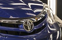 Toyota forecasts profit slump from strong yen
