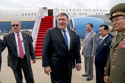 Secretary of State Mike Pompeo, center, arrives in Pyongyang on July 6.
