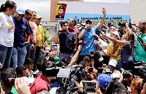 Venezuela president threatens to seize factories as opposition pushes for referendum