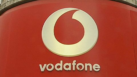 Vodafone's underlying earnings rise, losses through Luxembourg tax hit
