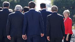 Image: Britain's Prime Minister Theresa May arrives for a family photo duri