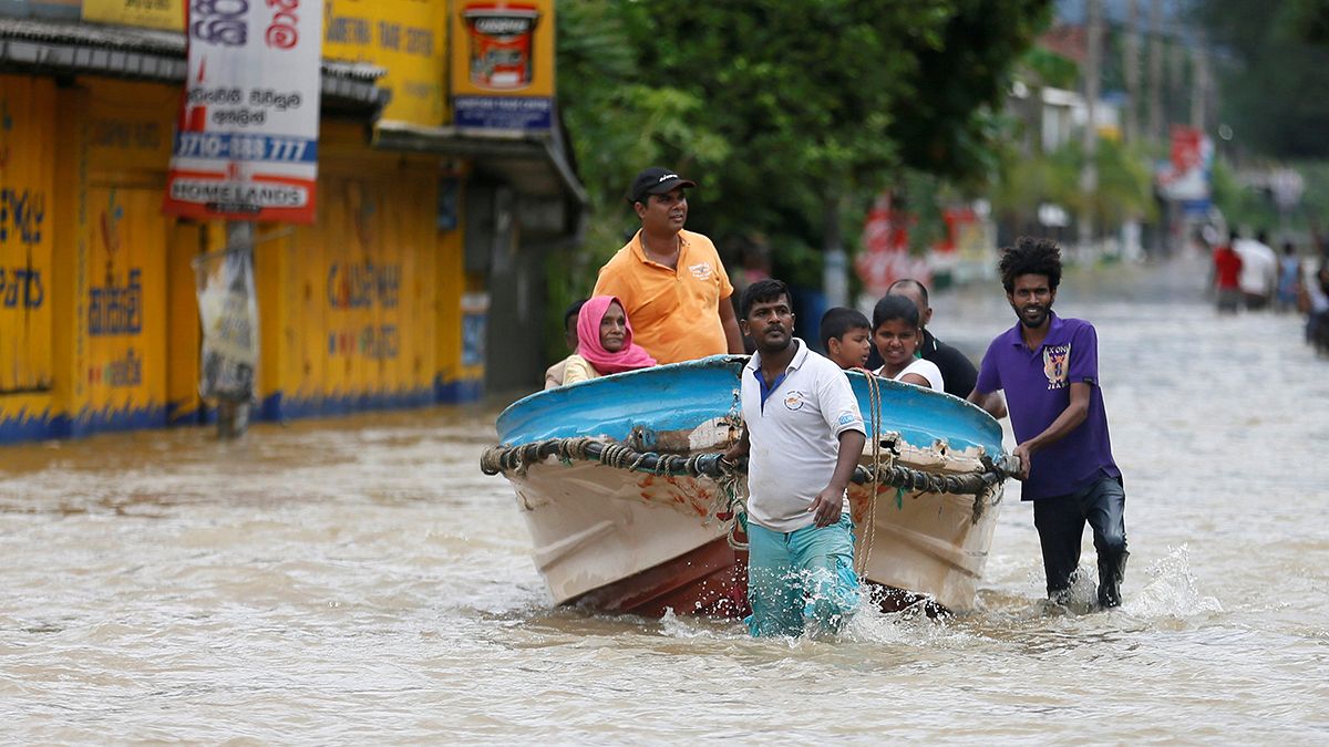 Over 100 feared dead as huge landslides bury Sri Lankan villages