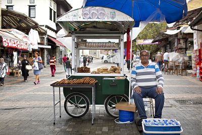 Suat Alkazan sells a popular Turkish snack, simit.