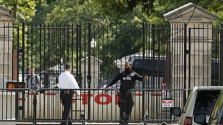 Lockdown at White House after armed man shot at checkpoint