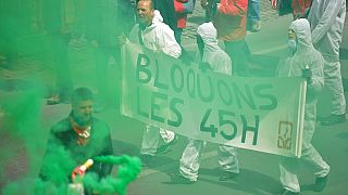 Tens of thousands march against Belgian austerity reforms in Brussels