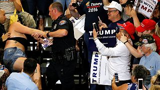 Violent clashes outside rally but Trump ever-confident of US election success