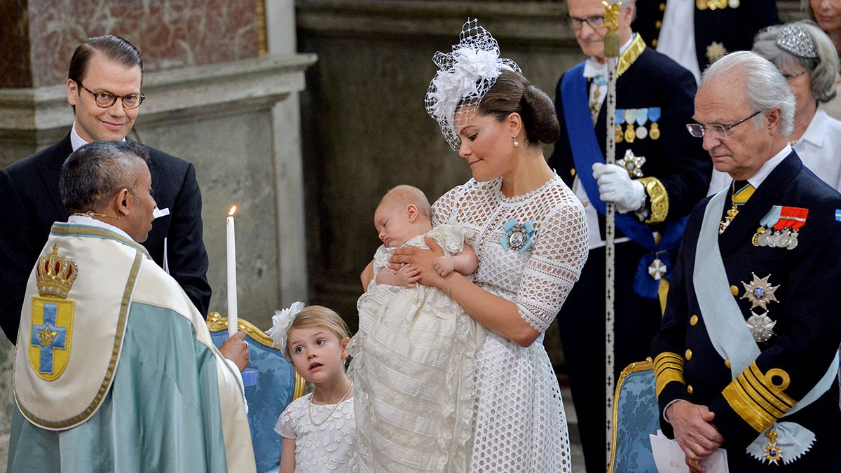 Sweden Prince Oscar christened in heirloom gown