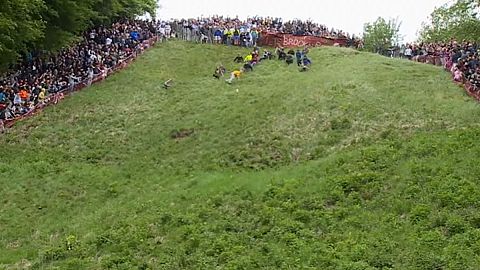 UK daredevils risk life and limb in cheese chase