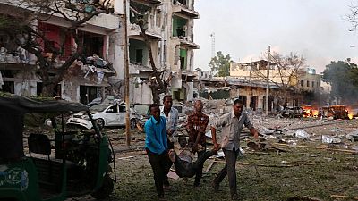 At least 10 killed in car bomb explosion, gunfire at a hotel in Somalia