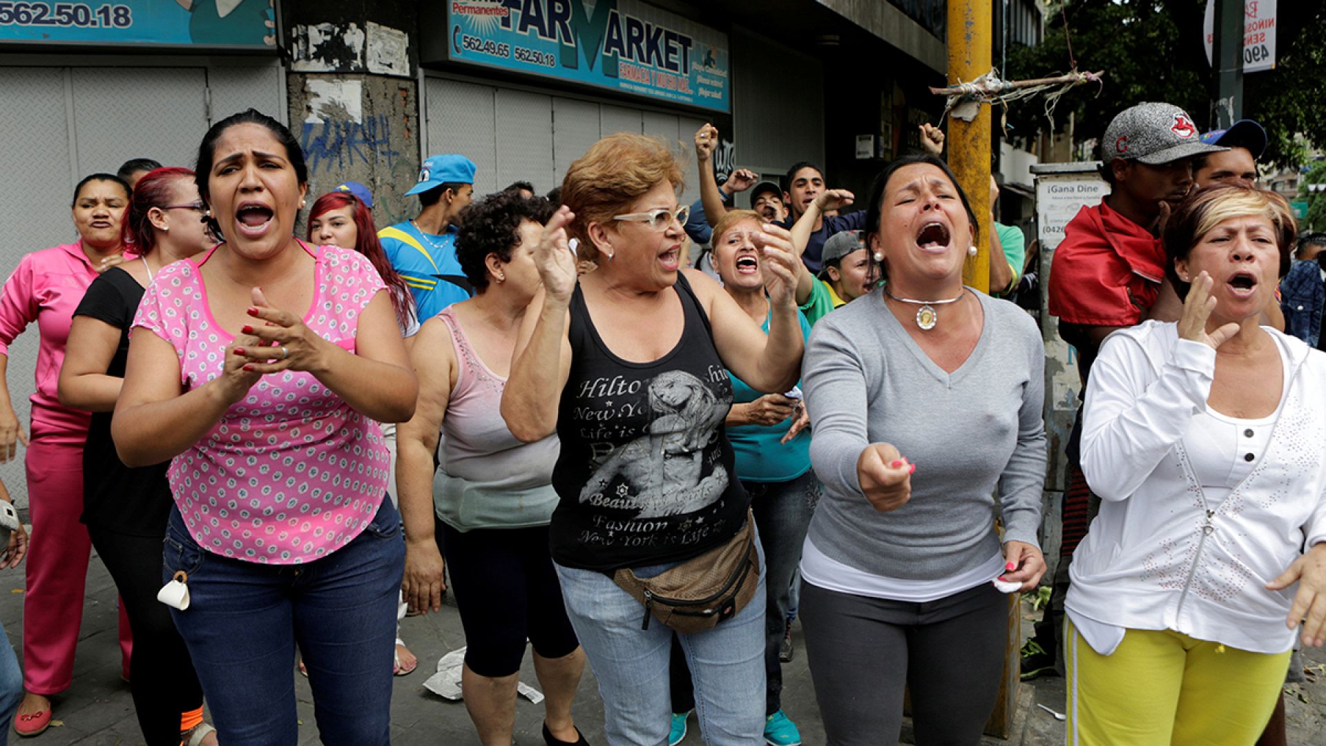 Venezuelans protest as the country suffers hyperinflation, power cuts ...