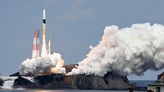Image: A H-IIA rocket carrying Hayabusa 2 space probe blasts off from the l