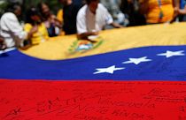 Venezuelan protesters demand a date for a recall referendum to oust President Maduro