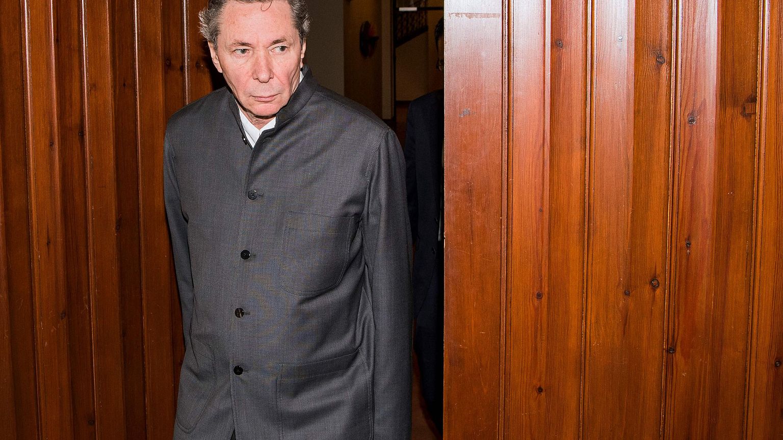 Image: Frenchman Jean-Claude Arnault arrives at the district court in Stock
