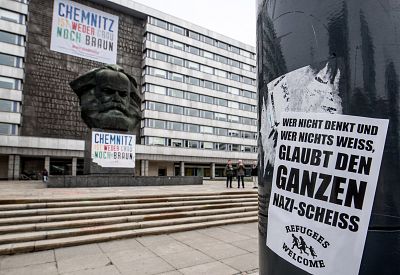 Anti Neo-Nazism sticker near statue of Karl Marx in central Chemnitz, Germany, on Oct. 1, 2018.