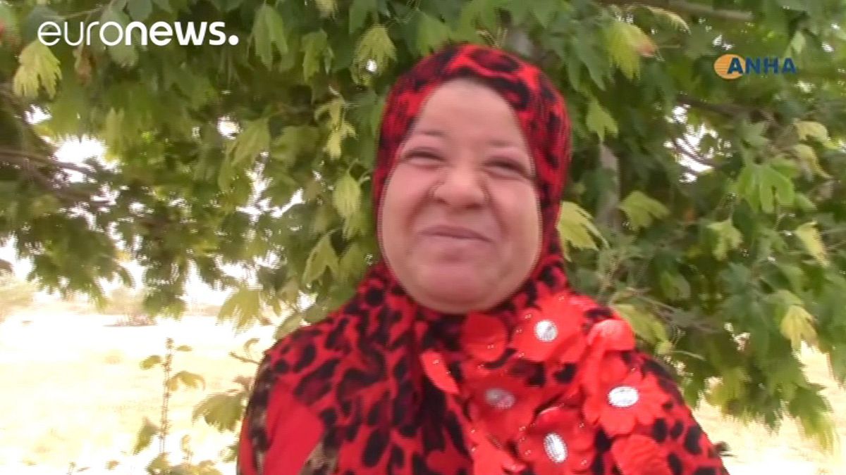 Residents in town ‘liberated from ISIL rule’ hold colourful celebrations